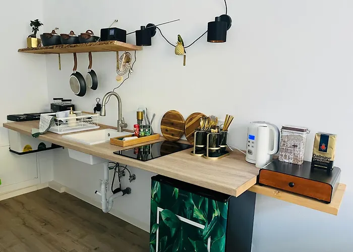 Filmap-apartments-zentrale Lage-boxspringbett-beamer-popcorn-gratis Parkplatz Appartement