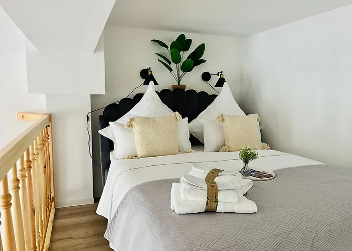 Filmap-apartments-zentrale Lage-boxspringbett-beamer-popcorn-gratis Parkplatz Appartement